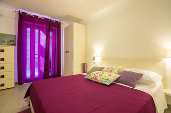 Tara Apartman *